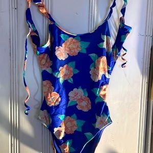 Women’s bathing suite ties with a low back .